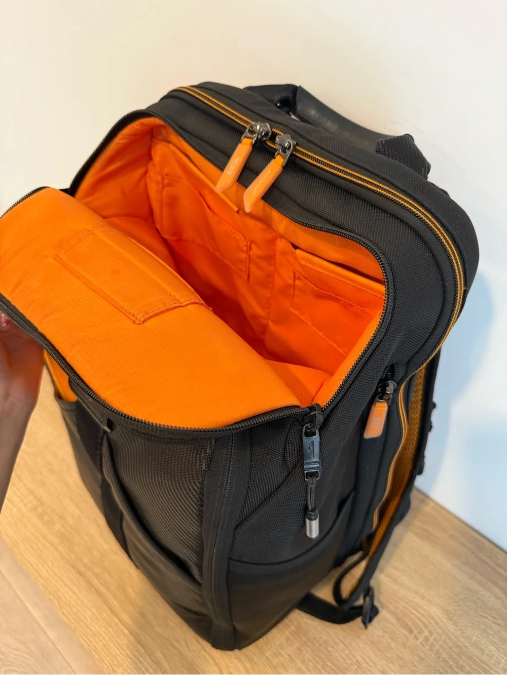 Tumi Black and Orange Men's Backpack with Detachable Travel Pouch